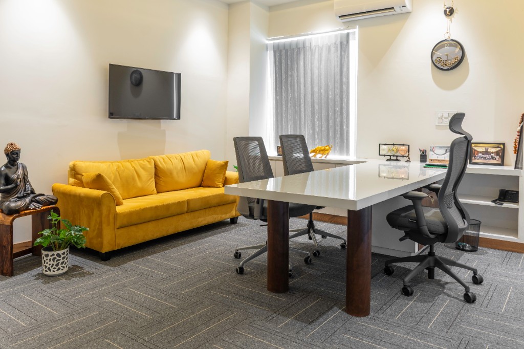 Private executive office with desk and seating